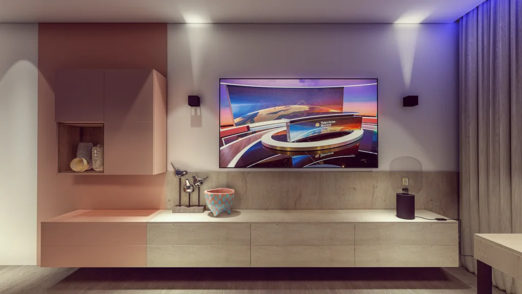 Moderná obývacia stena s TV, nízkym TV stolíkom v béžovej a marhuľovej farbe s ambientným osvetlením.